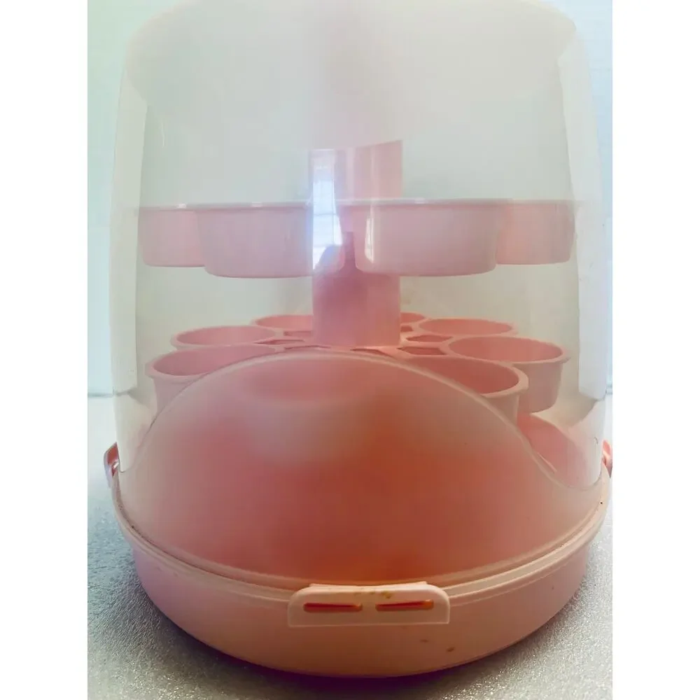 Pink Cup Cake Carrier.  Holds 12 Cup Cakes.  Can be disassembled.  Plastic